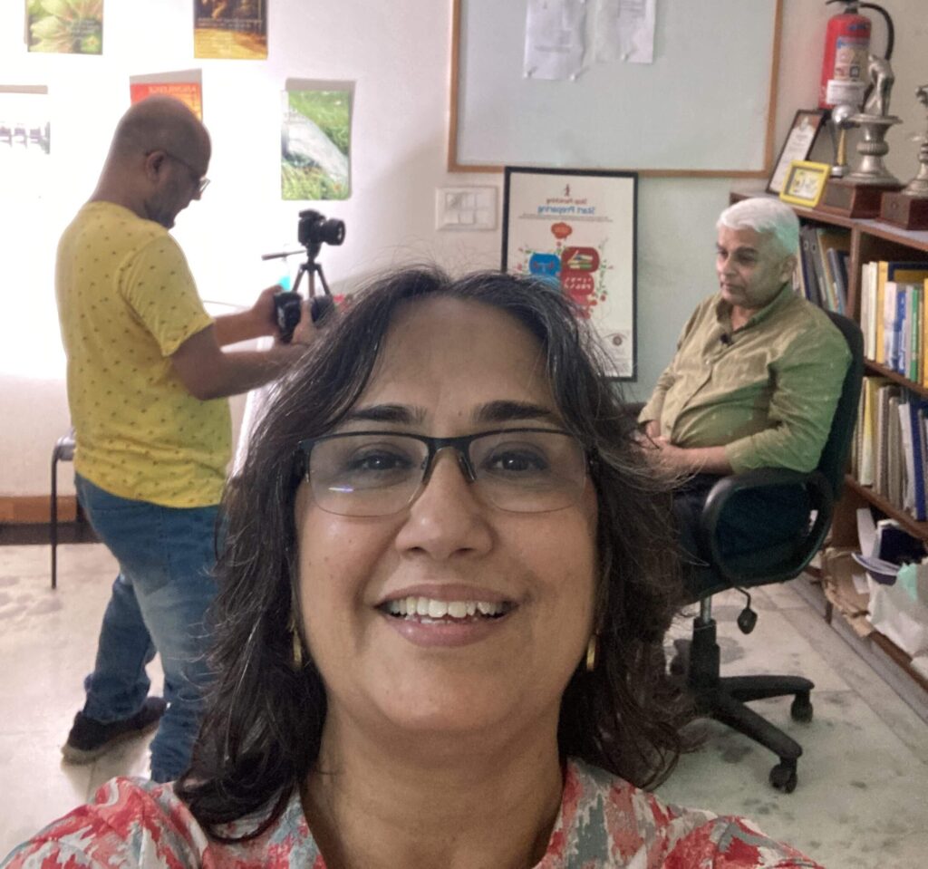 Selfie with Sourav in the background shooting with George Abraham in Delhi